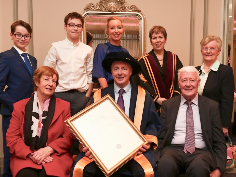 <p>Michael Gilvarry, General Manager of CERENOVUS (part of Johnson & Johnson), centre, who was conferred with a GMIT Honorary Fellowship, pictured with his wife Oonagh, sons Ruairi and Ronan, aunt Sr. Nancy Clarke, and (front) his parents Mary and Sean Gilvarry, from Kilfian, Co Mayo.</p>
